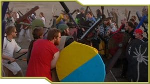 A massive crowd battle it out in a medieval combat