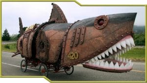 A giant steampunk shark on a bicycle featured in the Kinetic Sculpture Lab of Beyond Geek.