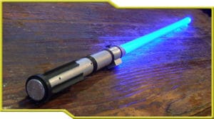 A Beyond Geek Lightsaber on a table.