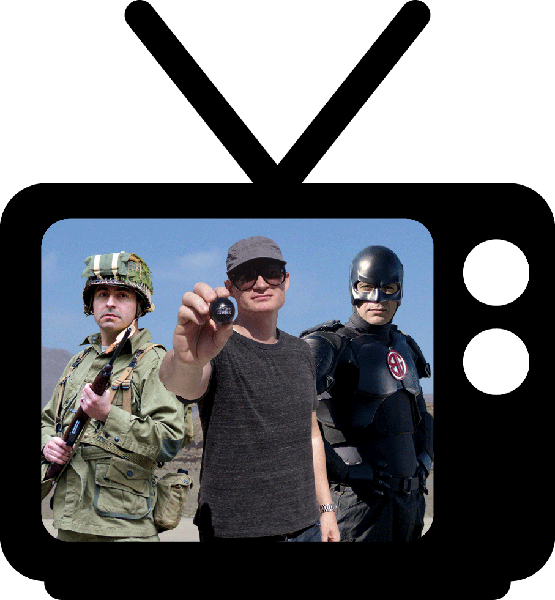 A tv screen with a man in a suit and a man in a helmet.