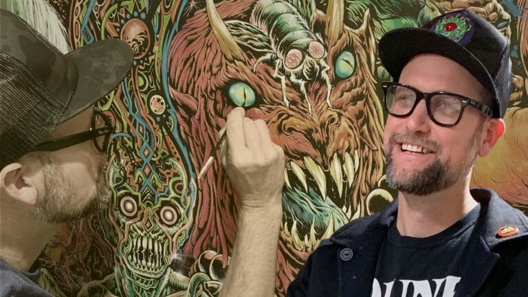 A man in a hat is creating a mural on a wall, inspired by Skinner Art.