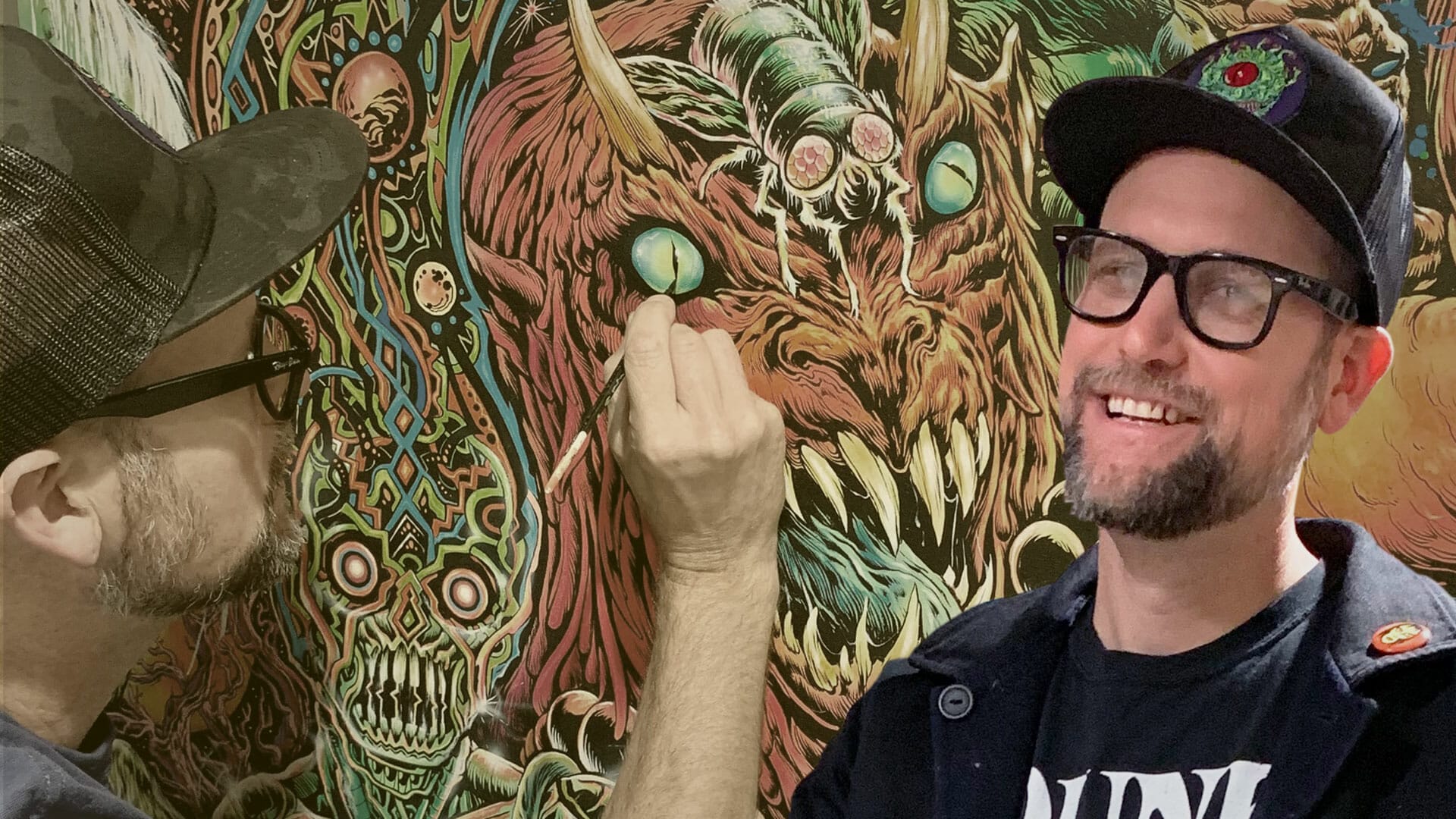 A man in a hat is creating a mural on a wall, inspired by Skinner Art.