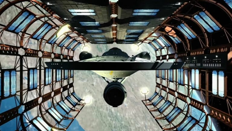 An image of a star trek spaceship inside a space station.